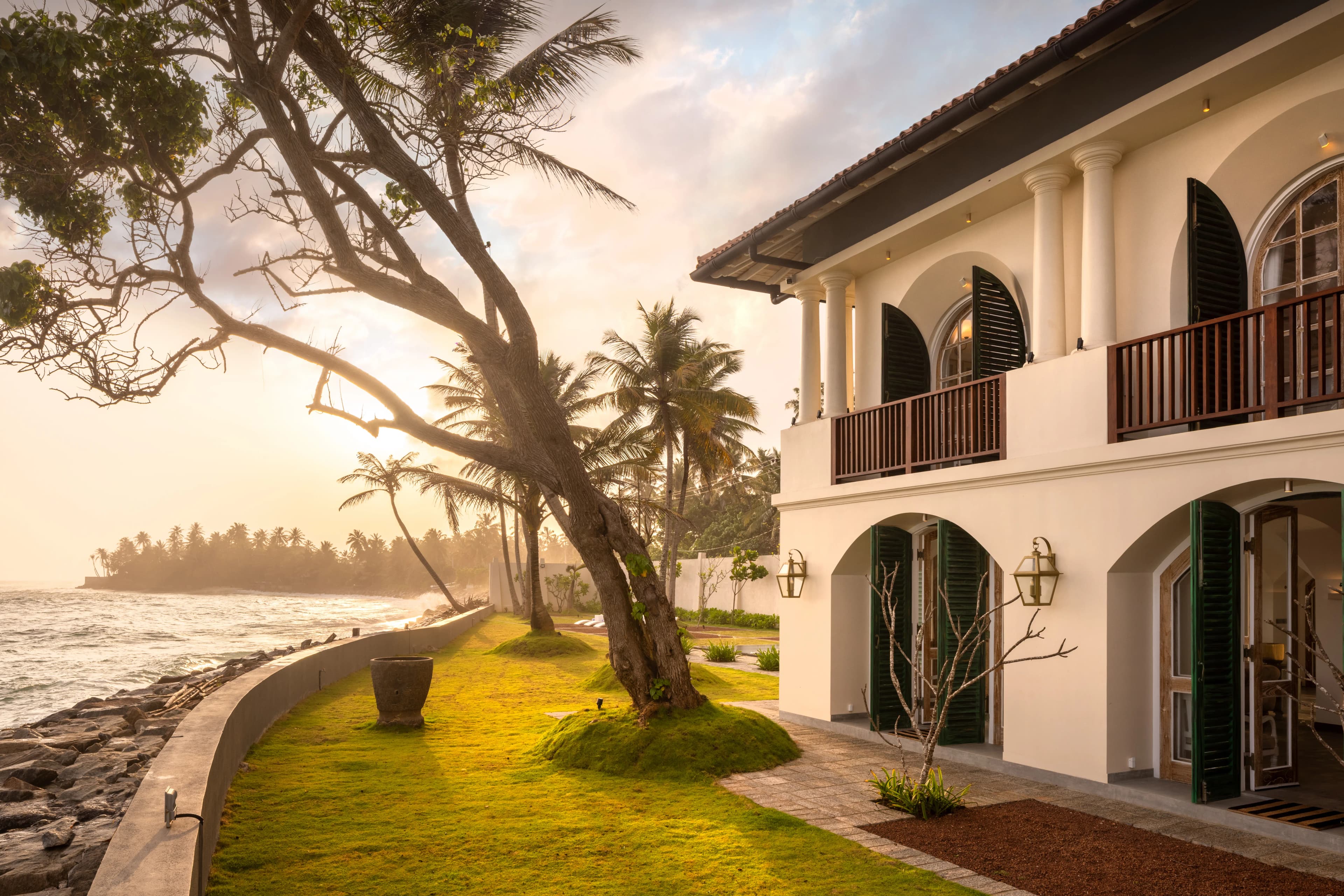 A serene view of the ocean from a luxurious suite at The Flute Mansion, showcasing the perfect blend of comfort and natural beauty.